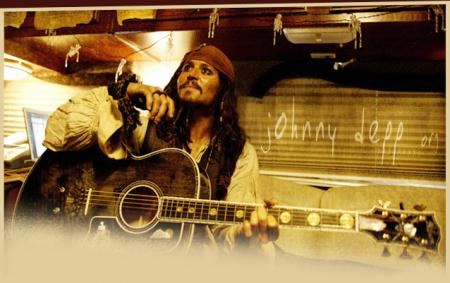 Jack Sparrow a la guitare lol!!!
